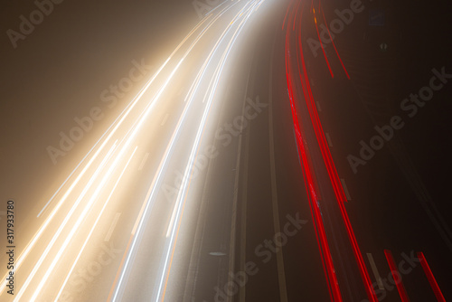 Road. Night. Trafic. Lights. Foggy. Red. Color