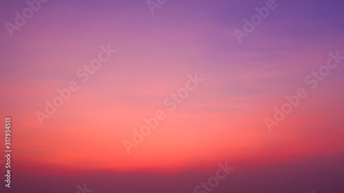 beautiful sky  Bright vibrant Purple colors real romantic sunset sky ,nature beauty color background Sunset sky magenta orange gradient mesh Impressive saturated colors. © Tanaban