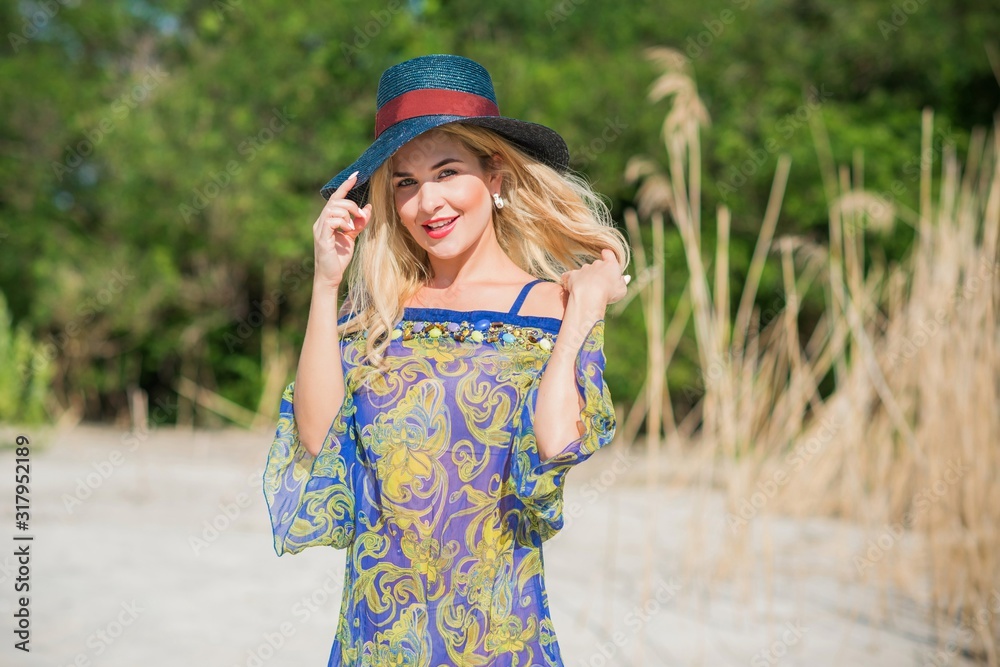 fashion, carefree, trip, palm, tourist, tanned, sunglasses, lounge, people, tanning, sunbathing, shore, smilePretty nice young woman in fashionable clothes rest at the beach, vacation and trip concept fashion, carefree, trip, palm, tourist, tanned, sunglasses, lounge, people, tanning, sunbathing, shore, smilePretty nice young woman in fashionable clothes rest at the beach, vacation and trip concept