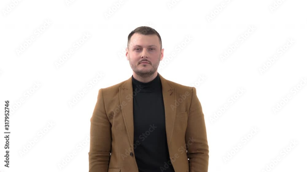 Handsome man wearing formal style clothes pointing with finger to the camera and to you. Hand sign, confident gesture Handsome man wearing formal style clothes pointing with finger to the camera and to you. Hand sign, confident gesture