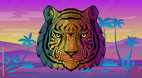Patterned head of the tiger on the mountains, beach background. African, indian design. Abstract ethnic picture tiger head with an unusual ornament.  Multi-colored ornament painted by hand.