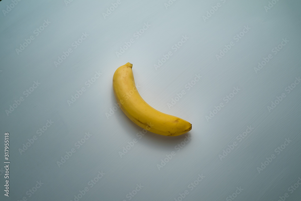 one yellow banana isolated on white background one yellow banana isolated on white background