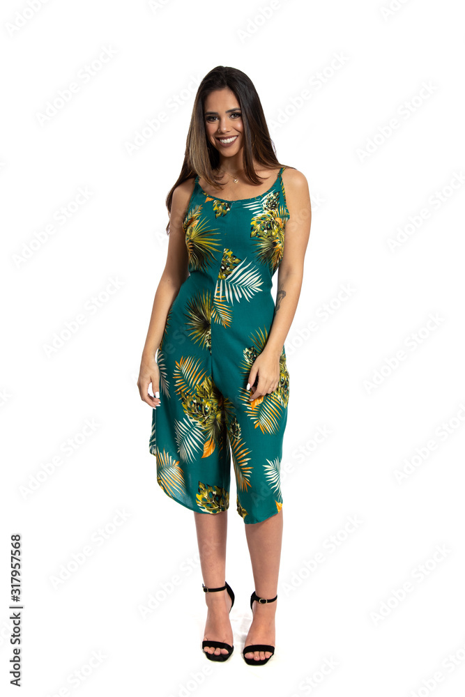 Well-dressed model portrait of smiling girl in casual pretty clothes. Brunette lovely lady on white background. Happiness, positivity and fashion Well-dressed model portrait of smiling girl in casual pretty clothes. Brunette lovely lady on white background. Happiness, positivity and fashion