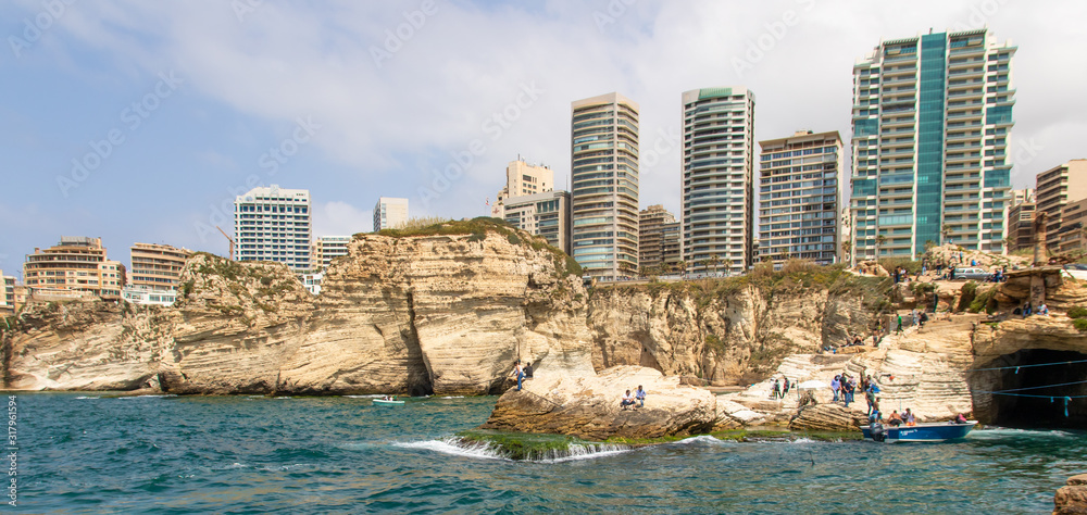 Fototapeta premium Beirut, Lebanon - probably the most popular landmark in Beirut, the Raouché Rocks are a wonderful spot visitated by thousands of tourists every day