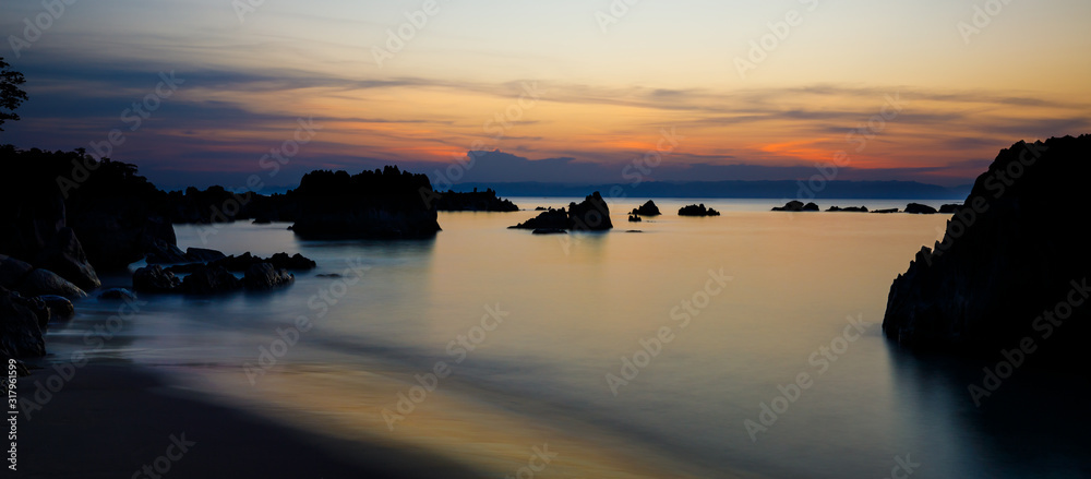 Fototapeta premium Idyllic sunset at remote beach of Tampolo, Masoala National Park, Madagascar