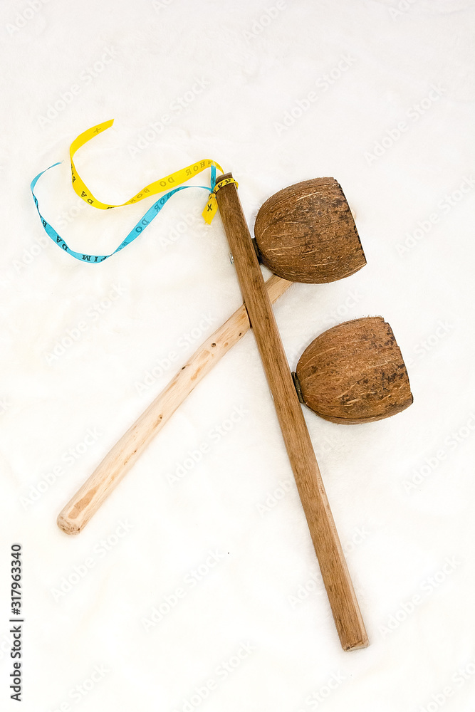 Agogo - traditional music instrument used in capoeira. Home made instrument.