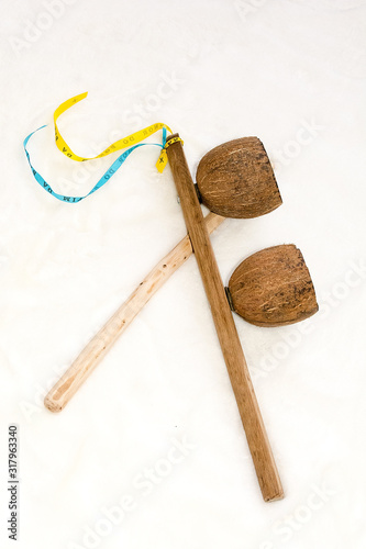 Obraz na płótnie Agogo - traditional music instrument used in capoeira. Home made instrument. w salonie