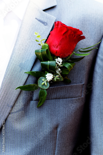 Flower on husband suit photo