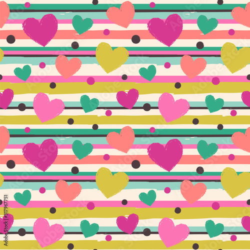  Seamless vector pattern with stripes, hearts and dots.