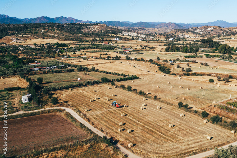 Fototapeta premium Field with bales in Cyprus
