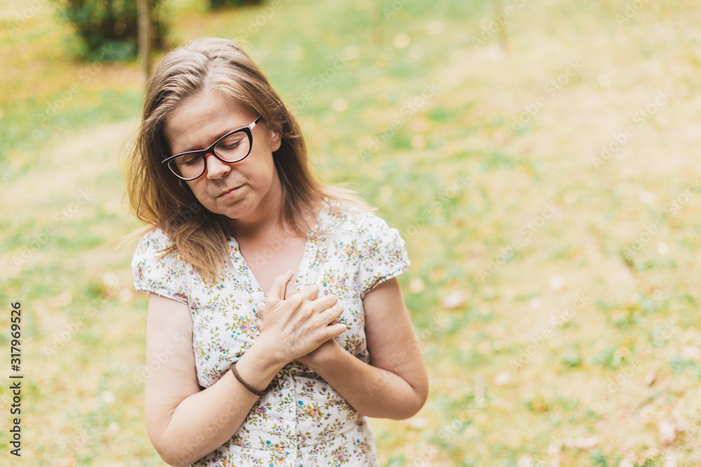 Woman suffering of chest pain Woman suffering of chest pain