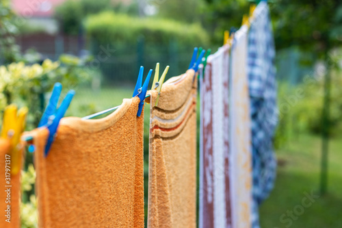 Laundry is hanging on clothesline outddors