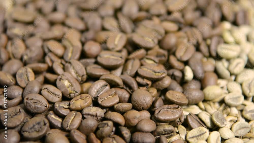 Two varieties of coffee. Green and black, roasted and not fried. Two varieties of coffee. Green and black, roasted and not fried.