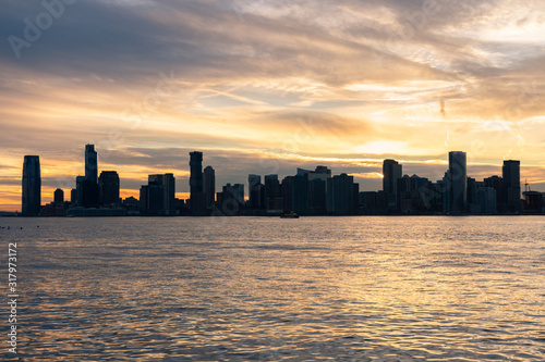 Jersey City Skyline along the Hudson River during a Beautiful Sunset © James