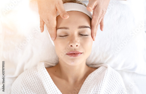 Woman Relaxes in the Spa Body massage Treatment.