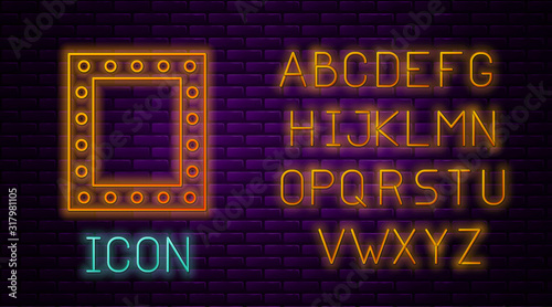 Glowing neon line Makeup mirror with lights icon isolated on brick wall background. Neon light alphabet. Vector Illustration