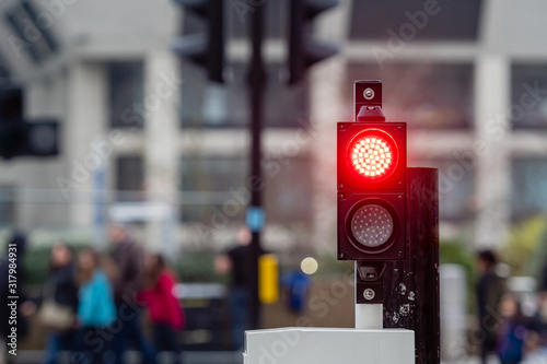 Red traffic lights  on a blurred street background