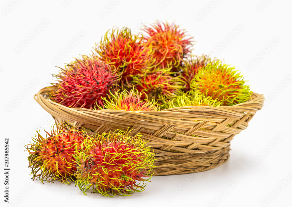 Close up fresh rambutan sweet and delicious fruit in basket isolated on white background. Close up fresh rambutan sweet and delicious fruit in basket isolated on white background.