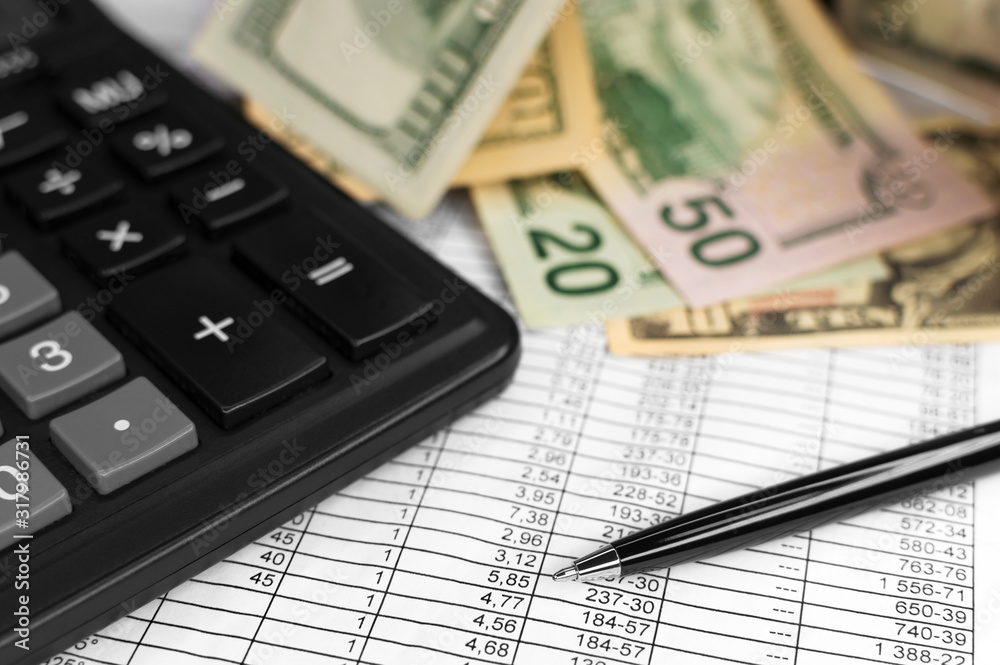 Accounting. Calculator, bills and pen. Business, finance conceptual.