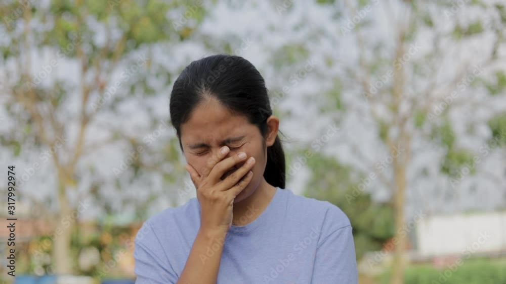 Asian women wearing protective mask to protect against germs and air pollution , health care concept Asian women wearing protective mask to protect against germs and air pollution , health care concept