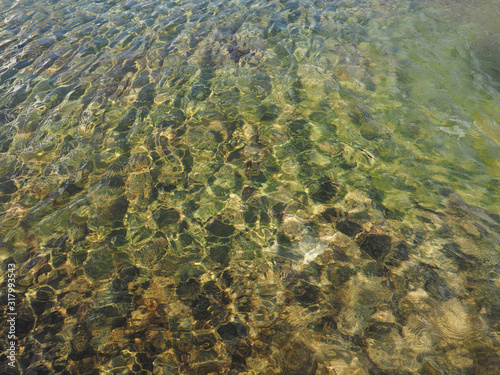 green blue water surface background © Claudio Divizia