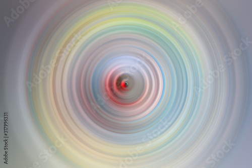 Abstract round background. Circles from the center point. Image of diverging circles. Rotation that creates circles.