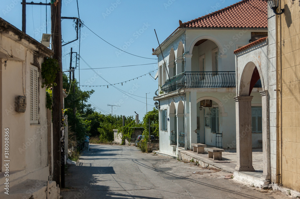 Narrow street in an old town in Greece