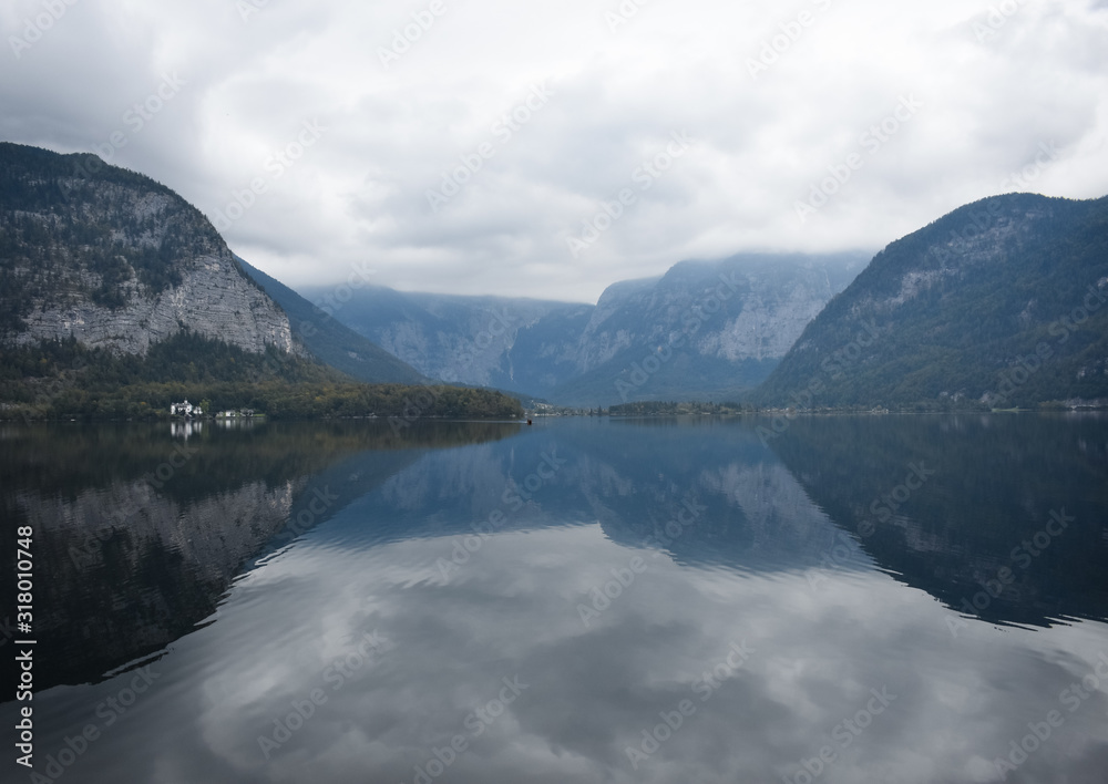The reflection of Lake Hallstatt on a cloudy day