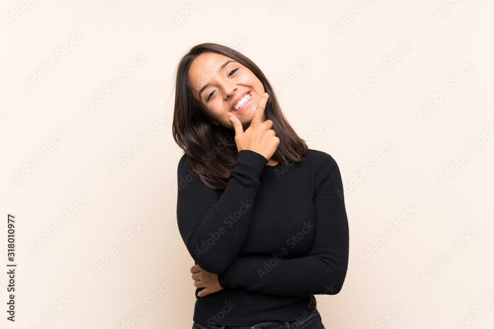 Young brunette woman with white sweater over isolated background smiling Young brunette woman with white sweater over isolated background smiling