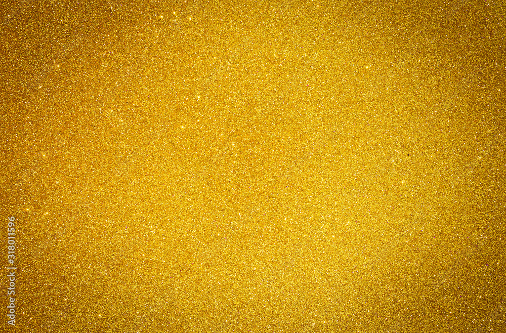 Yellow gold shiny glitter abstract texture background.
