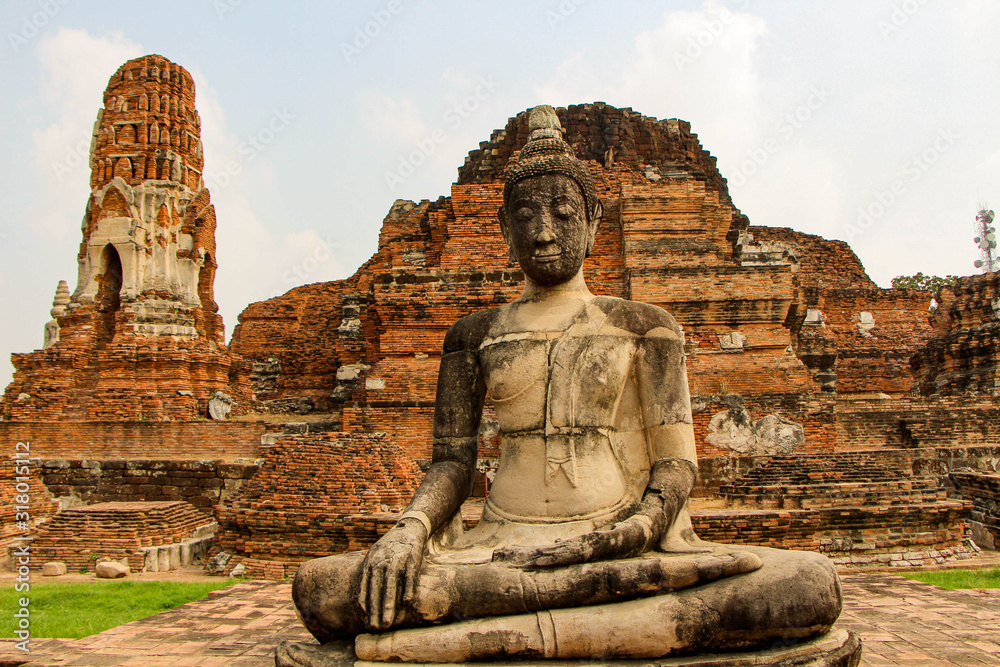 Statues of Buddhist monks in the ancient city of Ayutthaya, Thailand.