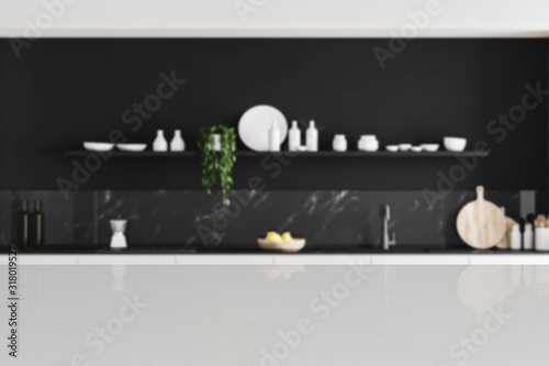 Table for your product in blurry black kitchen