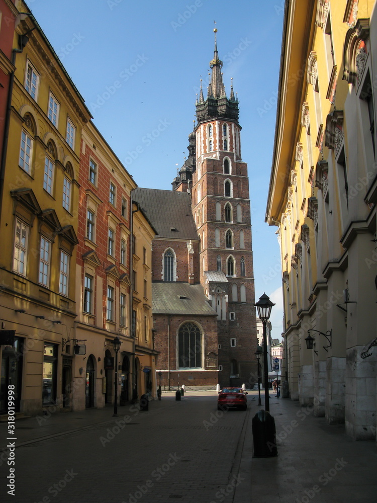 view of Florianska street and towers of St. Mary's Basilica, Krakow, Poland