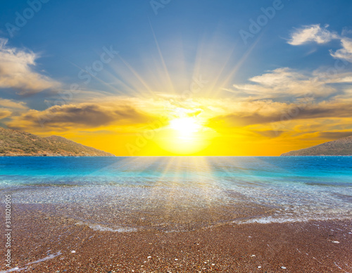 Fototapeta Naklejka Na Ścianę i Meble -  sandy sea beach at the sunset, summer vacation background