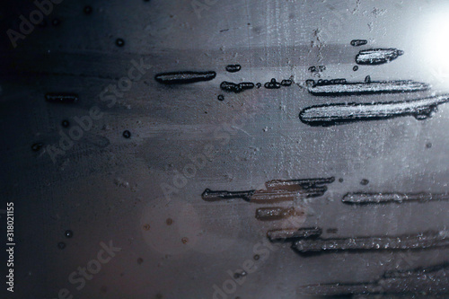 Texture painted with ice on a glass window. Without focus bokeh