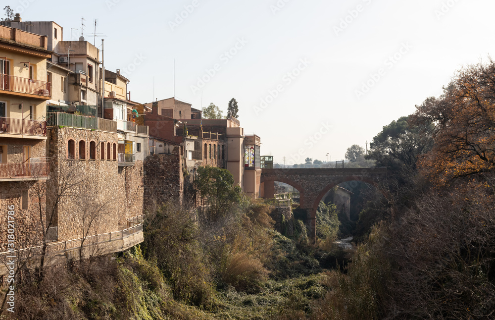 Obraz premium Romanesque bridge of Caldes de Montbui. Medieval roman village in Catalonia, Spain