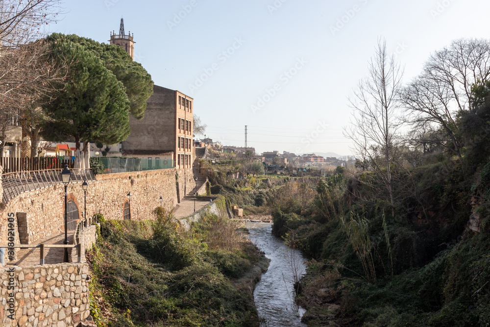 Caldes de Montbui village in Catalonia, Spain and its river named Riera de Caldes