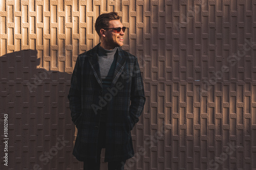 Handsome  Attractive Fashionable Young Adult Man Portrait at Brick Wall