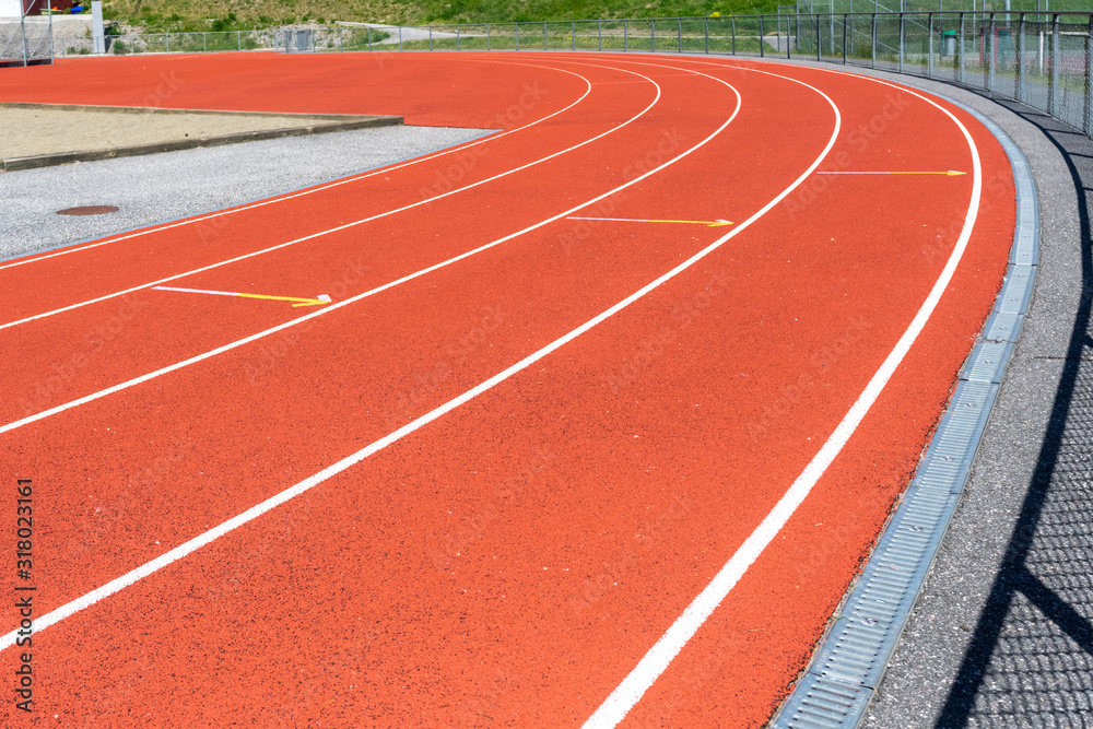 Running track in stadium. Red Running Race track rubber with lines. Stadium Empty Running track background.