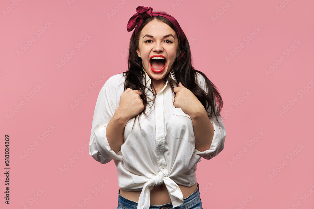 True emotions, feelings and reaction. Horizontal shot of trendy looking young woman wearing head scarf and red lipstick staring at camera in shock, being astonished with shocking news, opening mouth True emotions, feelings and reaction. Horizontal shot of trendy looking young woman wearing head scarf and red lipstick staring at camera in shock, being astonished with shocking news, opening mouth
