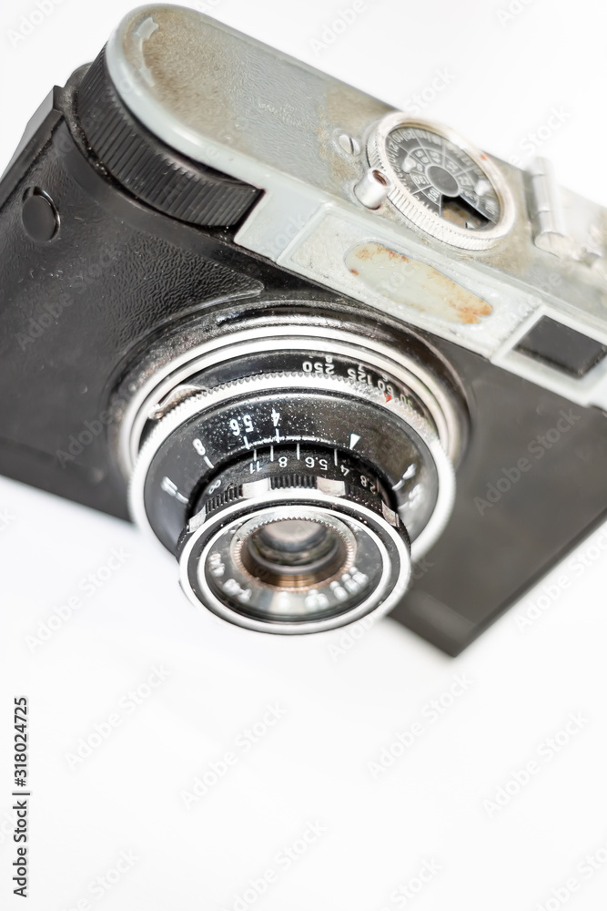 Retro old film photo camera. On white background Retro old film photo camera. On white background