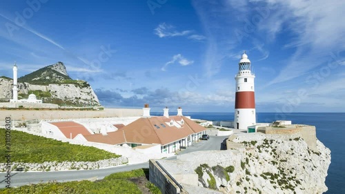 Time lapse of Ibrahim-al-Ibrahim Mosque and Trinity lighthouse, Europa Pont, trait of Gibraltar, Gibraltar photo
