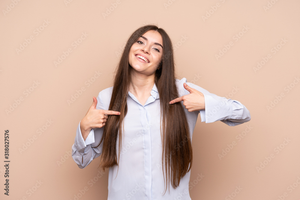Young woman over isolated background proud and self-satisfied Young woman over isolated background proud and self-satisfied