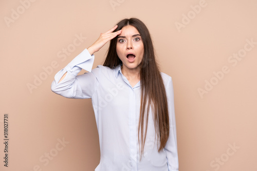 Young woman over isolated background has just realized something and has intending the solution
