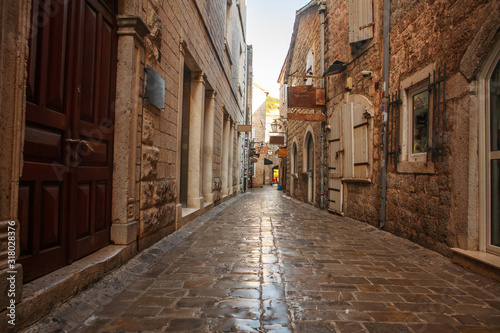 Fototapeta Naklejka Na Ścianę i Meble -  Streets of the old stone city, medieval Mediterranean architecture