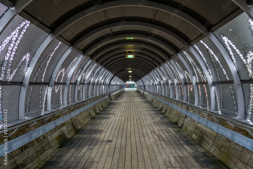Footpaht and walkway trough a tunnel over the road and railway from the Hilversum Media Park to the nearby train station. Footpaht and walkway trough a tunnel over the road and railway from the Hilversum Media Park to the nearby train station.