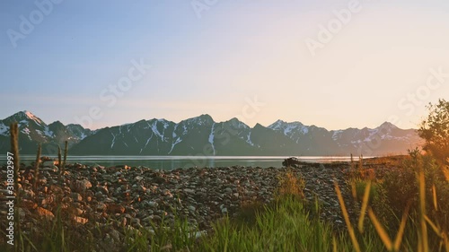 Sunset mountains and sea fjord Norway nature travel destinations Lyngen Alps landscape tranquil scenery photo