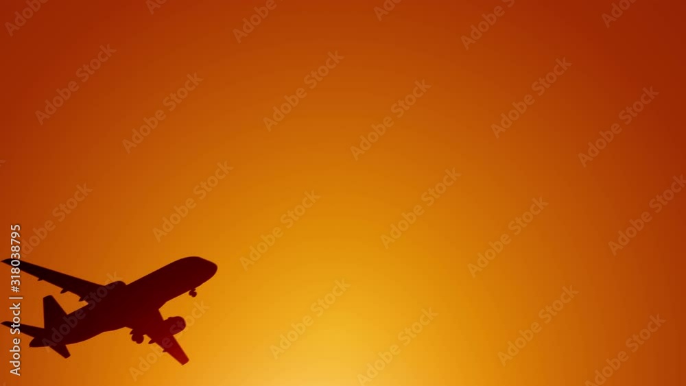 A large passenger plane takes off against the background of a sunset. Orange backgrand..Super slow motion.