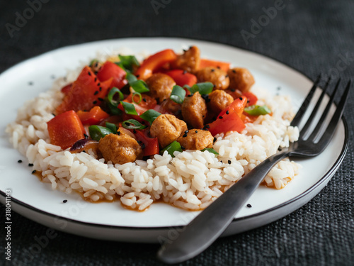 Szechuan TVP Chunks with Peppers on rice.