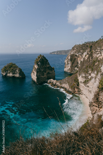 The most beautiful beach with white sand and azure water in Bali. Scenic view of Diamond Beach in Nusa Penida, Indonesia